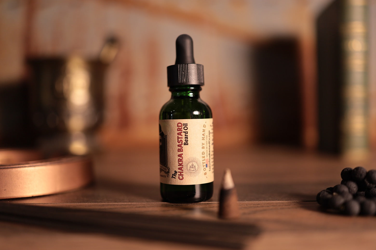 1oz green bottle chakra beard oil with dropper top